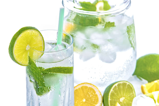 Lime and mint drink served cold in a clear glass